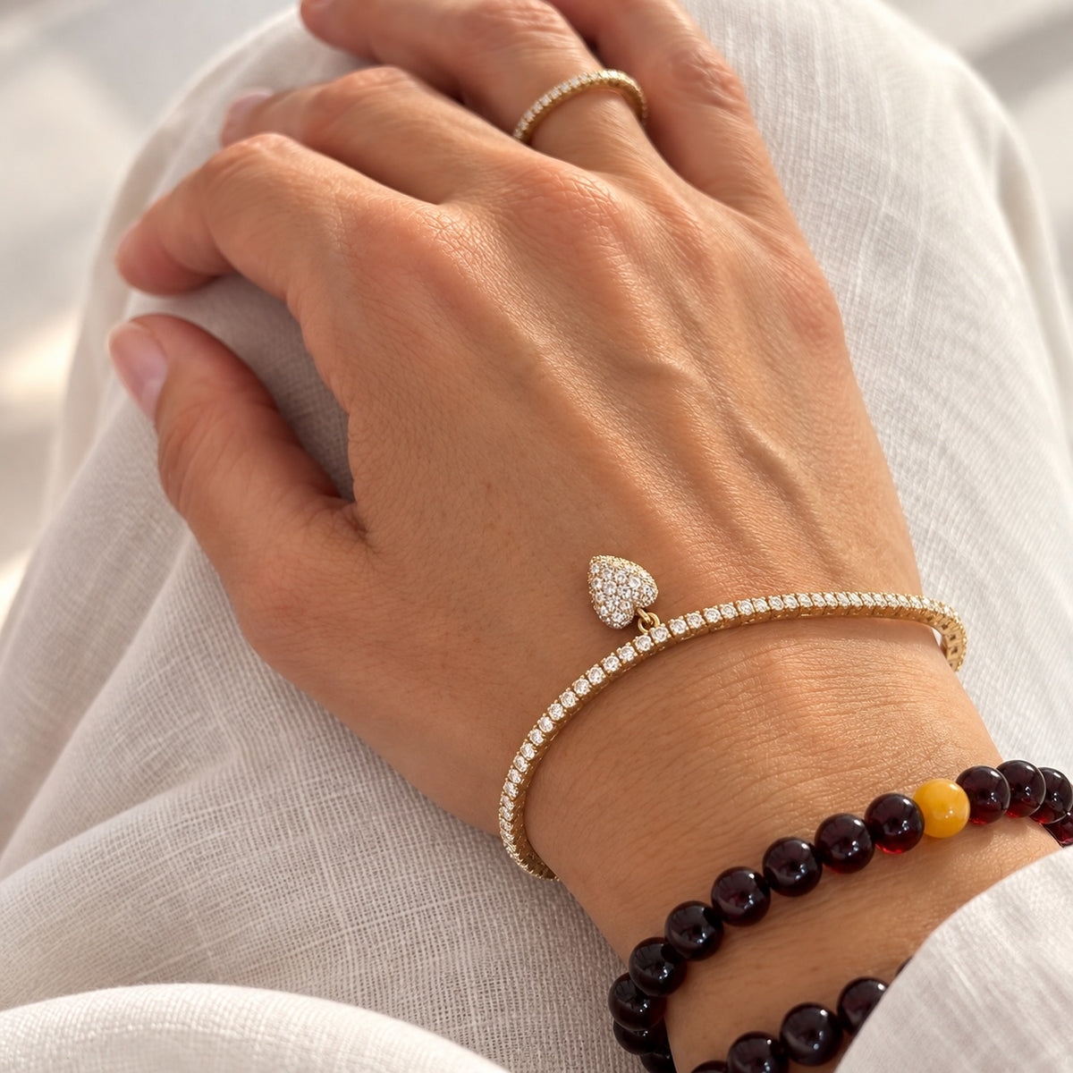 Tennis-Armband Gelbgold mit Herzanhänger